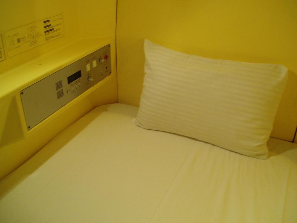 Capsule Hotel & Sauna Ikebukuro Plaza Tokyo Rom bilde